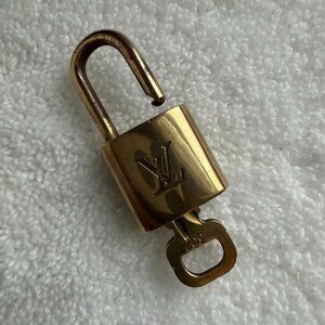 Louis Vuitton Gold Lock and Key Number 302